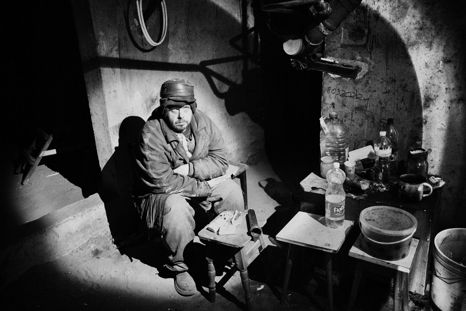 A soldier in a small room