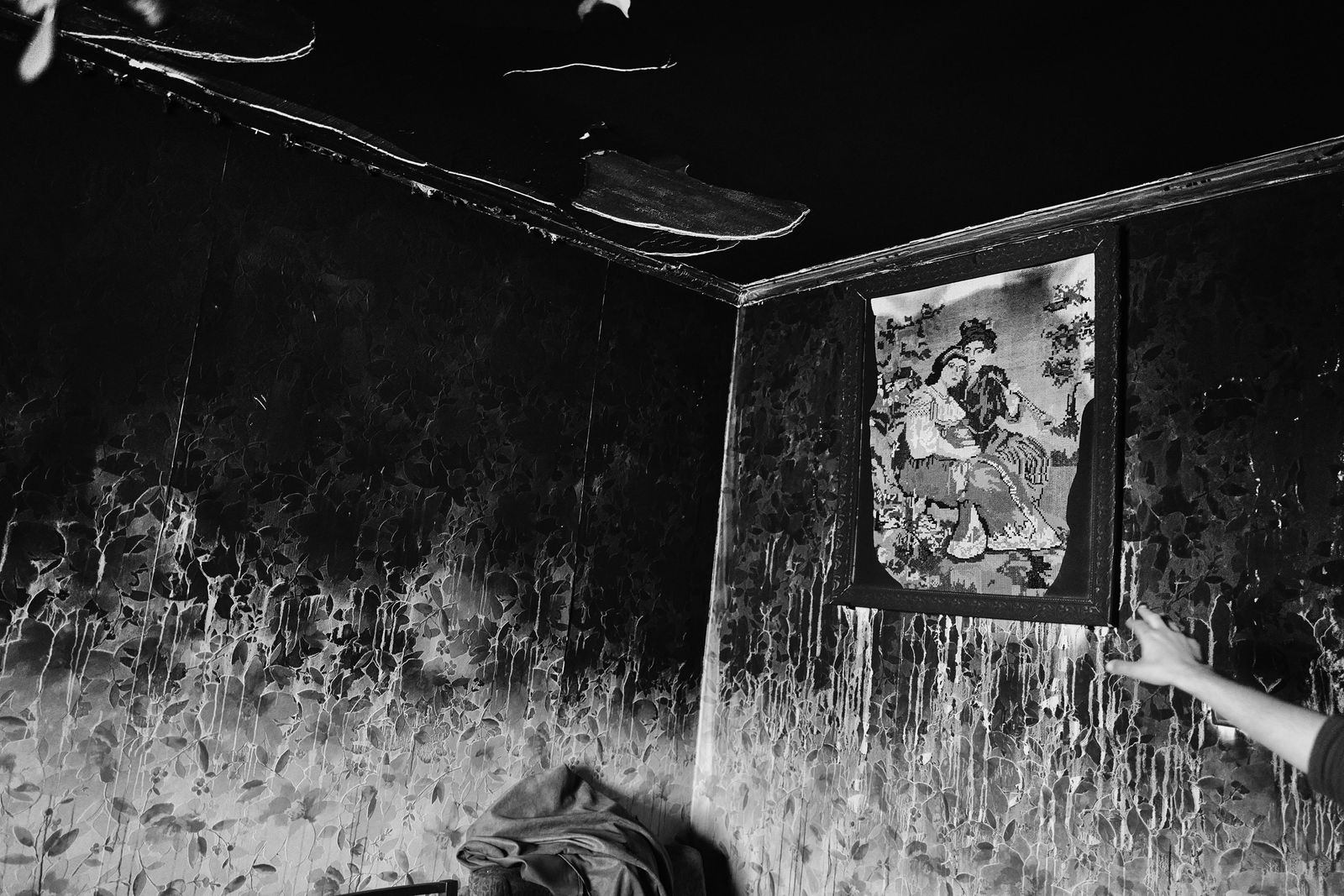 A painting in a burned home.