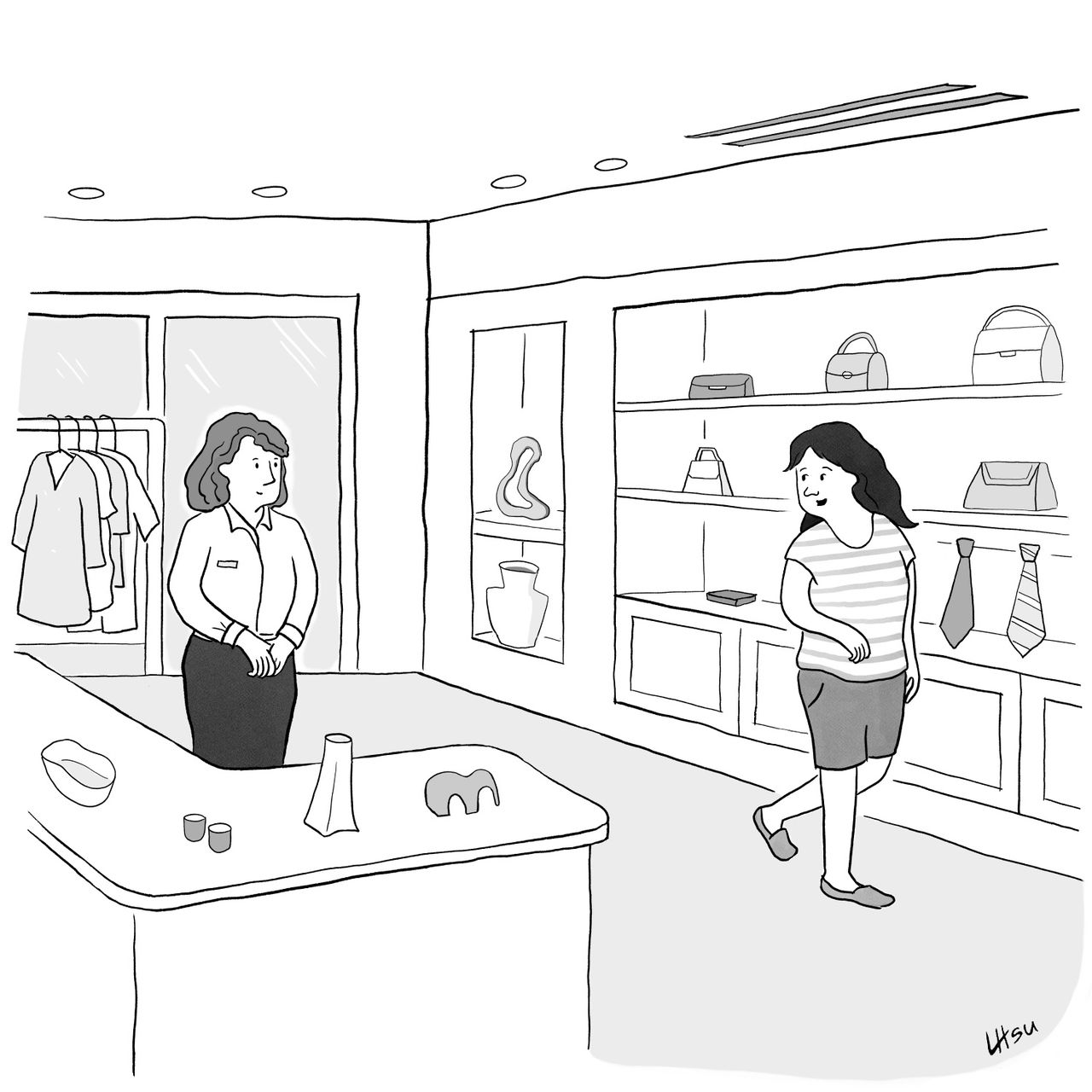 A woman in a store talks to a saleswoman.