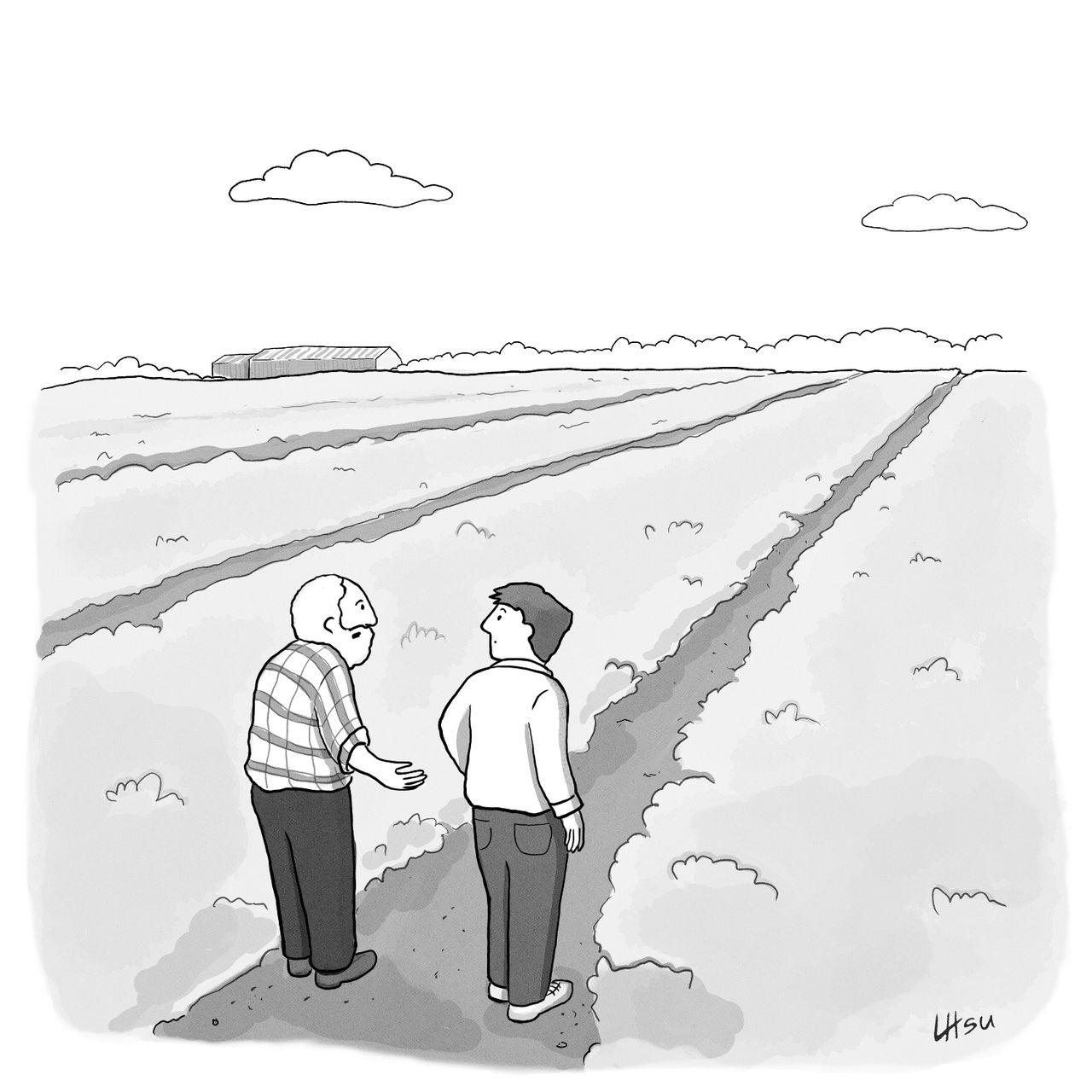 An older man and a younger one stand before a vast field.