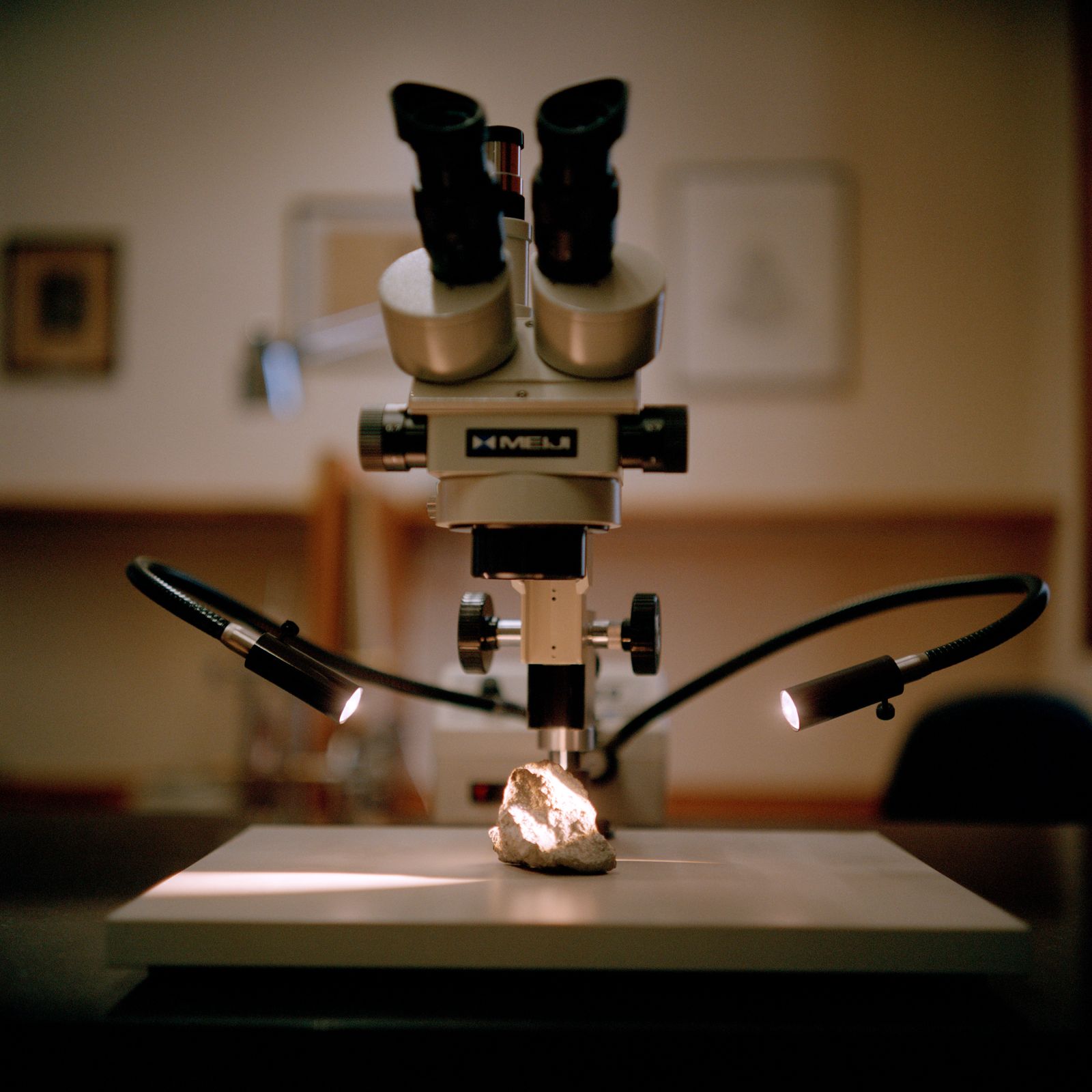 A microscope with a specimen placed underneath.